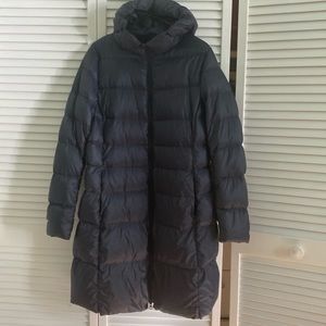 Uniqlo navy blue light puffer coat. Used once.